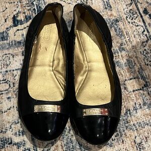 Coach Darsi black leather ballet flats cap toe gold tone logo hardware 9 1/2